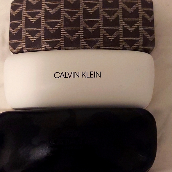 Michael Kors, Coach, Calvin Klein cases for glasses, money & so much more!